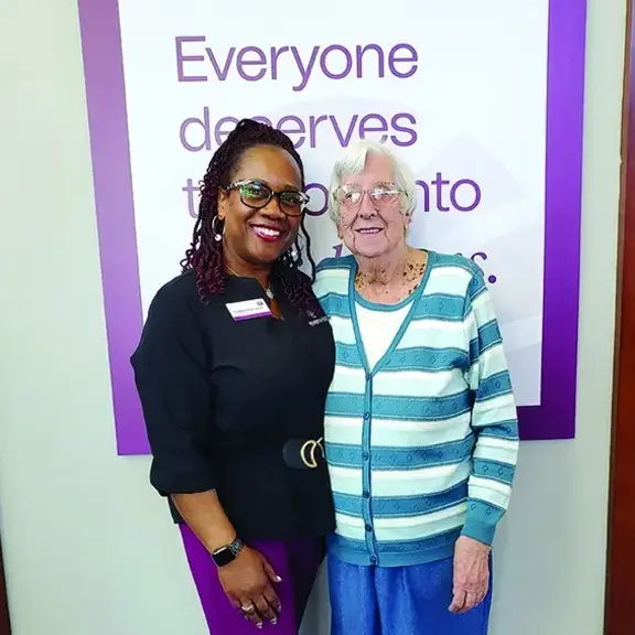 An Everwise employee and longtime member together at a branch.