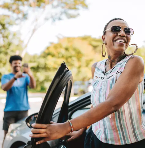 Couple of friends traveling by car