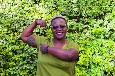 Woman flexing her arm