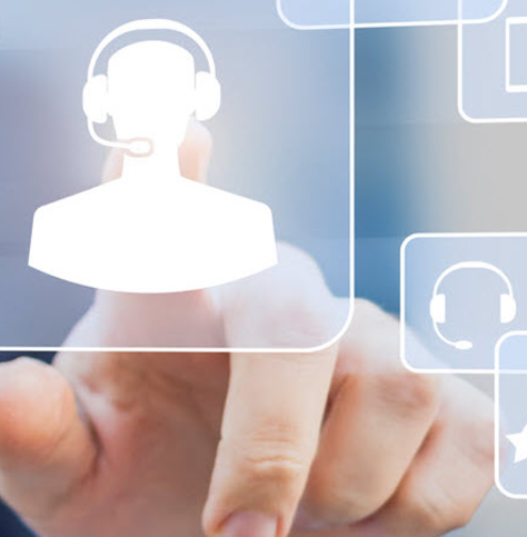 Image looking out from behind a computer touch screen as a person presses a contact us icon