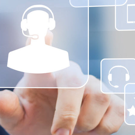 Image looking out from behind a computer touch screen as a person presses a contact us icon