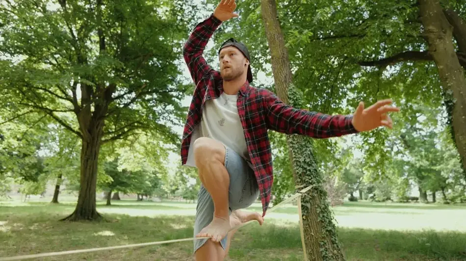 Guy on slack line risk