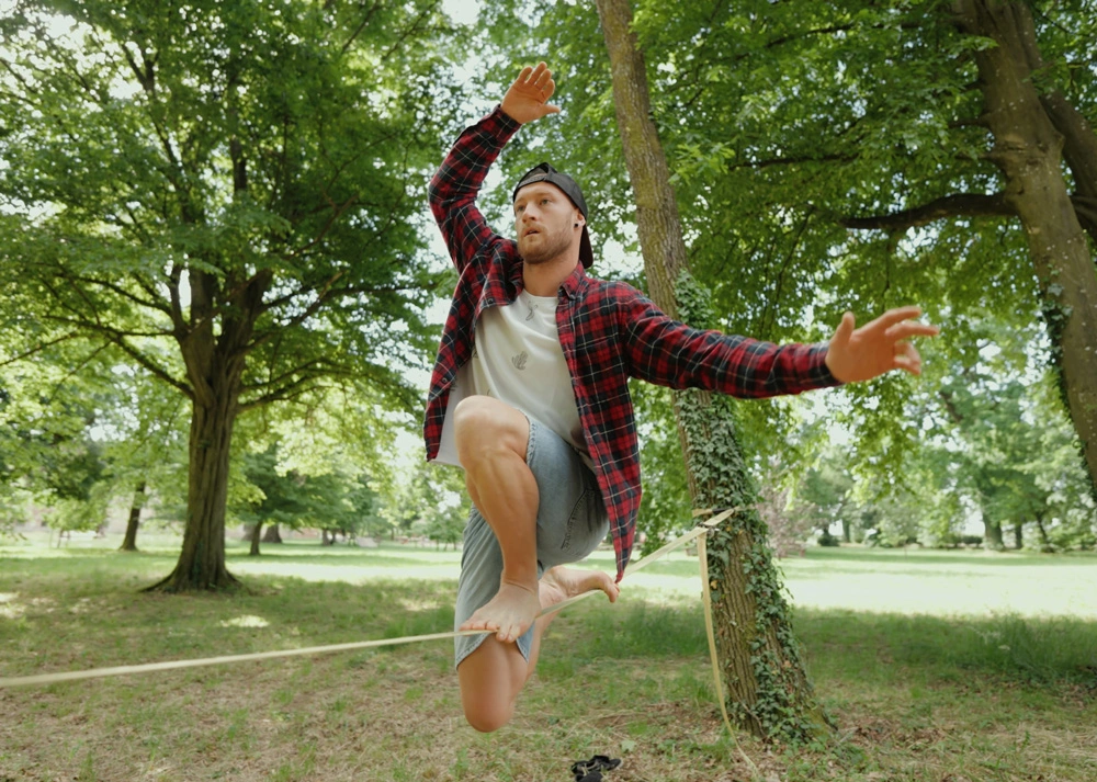 Guy on slack line risk