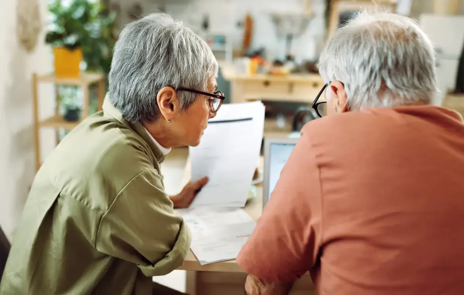 Older couple reviewing investments