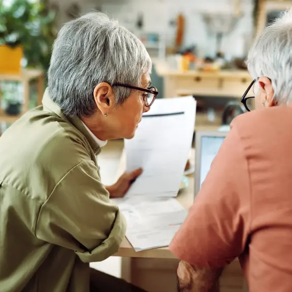 Older couple reviewing investments