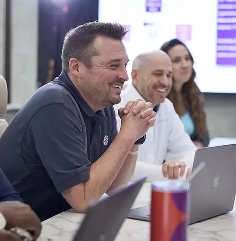 Group of business people in a board room. 