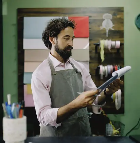 shop owner reviewing business accounting