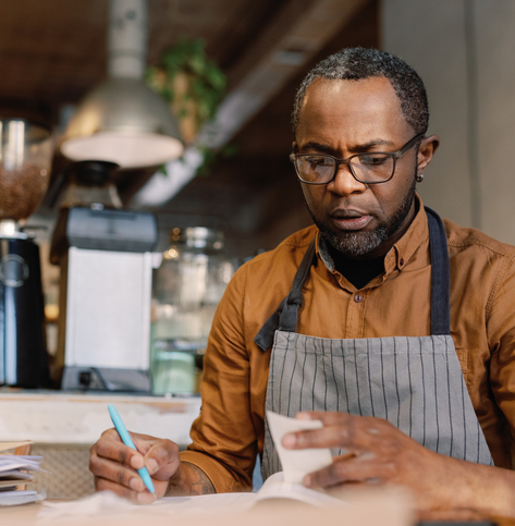 Businessman studying paperwork