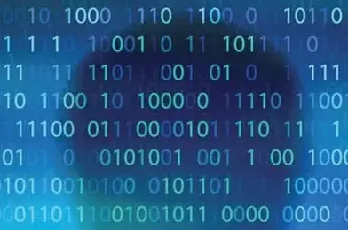 Abstract image of a translucent computer screen with a series of binary numbers, with an eerie shadow of a person behind the screen