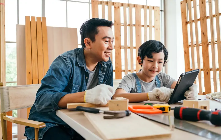 Father and son doing a wood working project