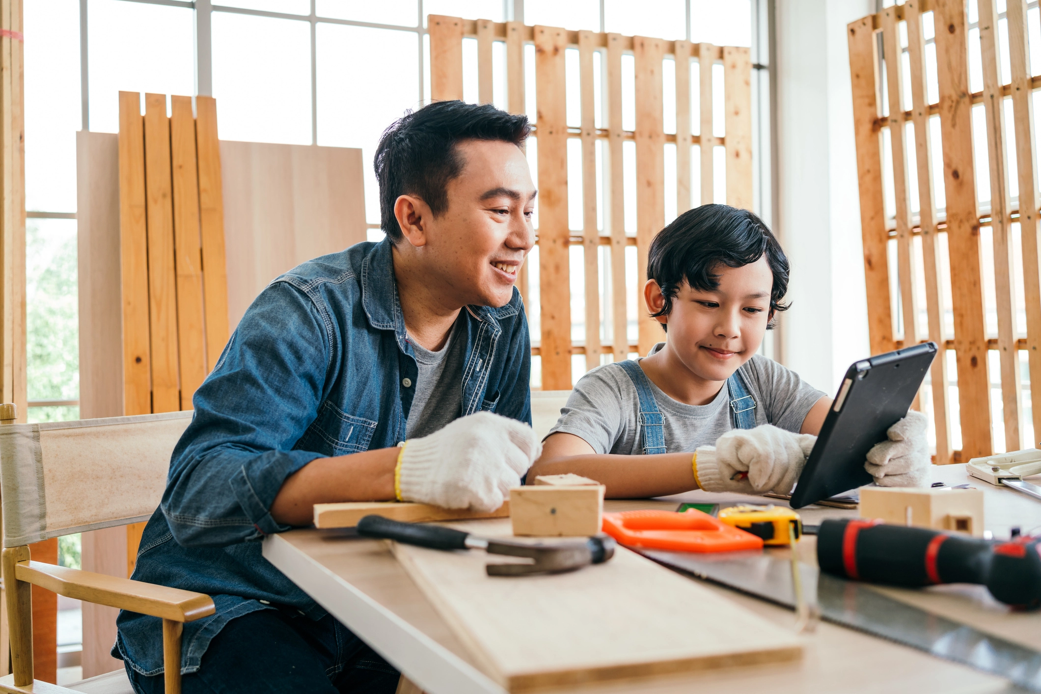 Father and son doing a wood working project