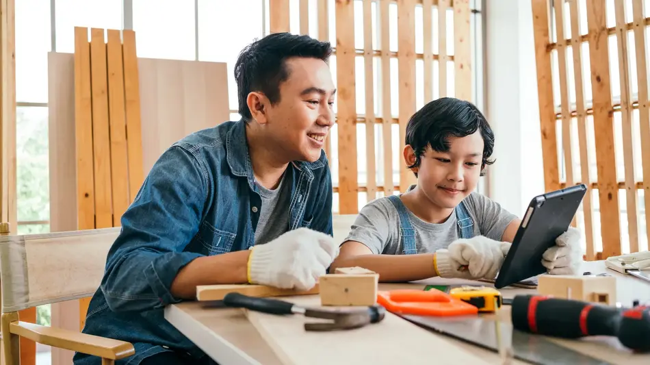 Father and son doing a wood working project