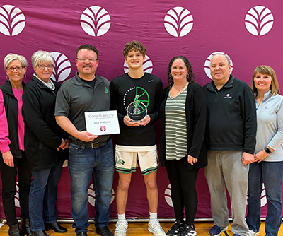 Jack Wildauer poses with his parents and Everwise staff