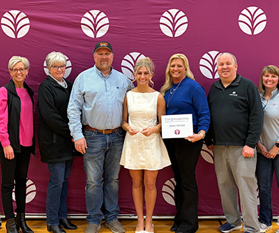 Sierra Hawley poses with her parents and Everwise staff